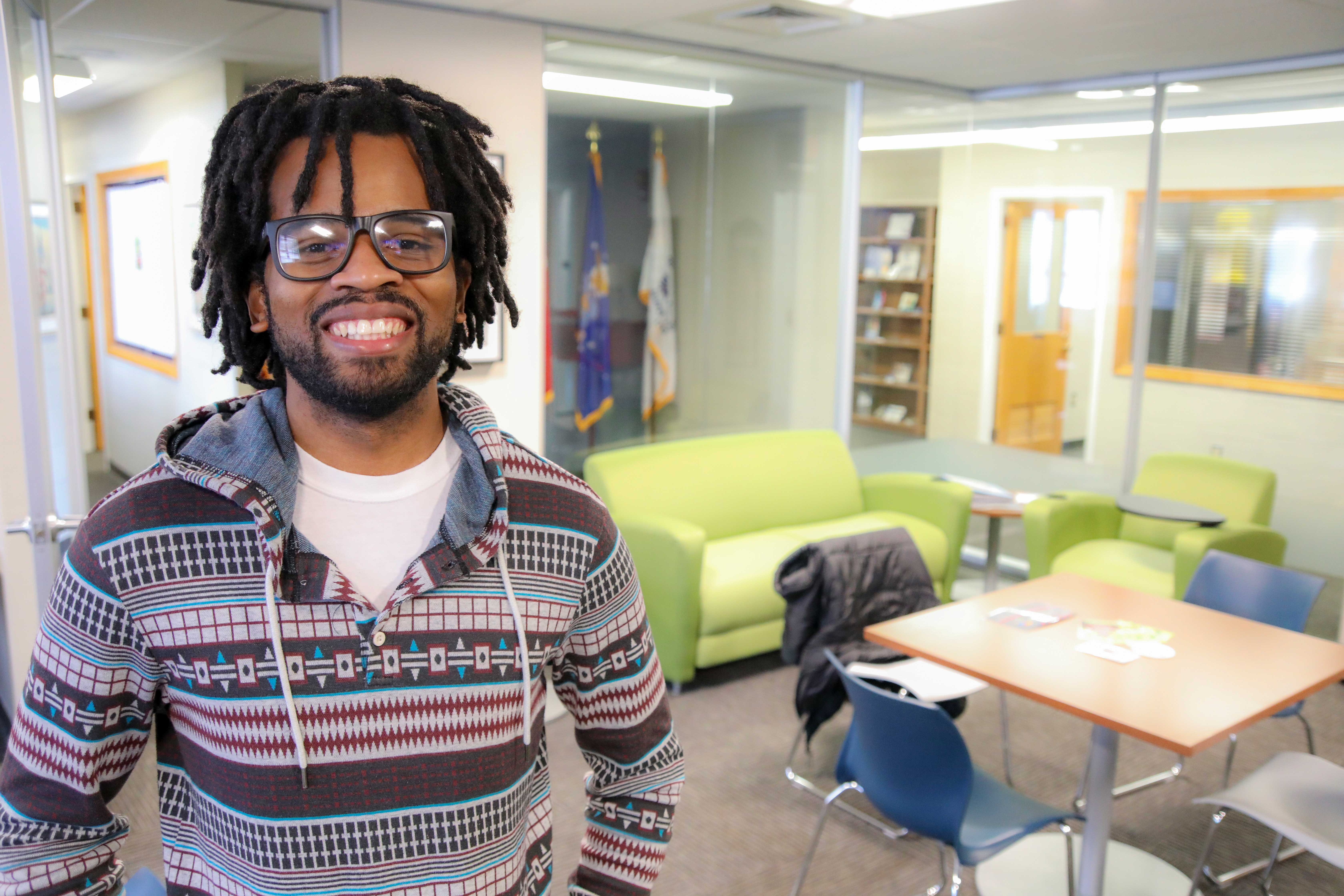 Omar Williams smiling at the camera